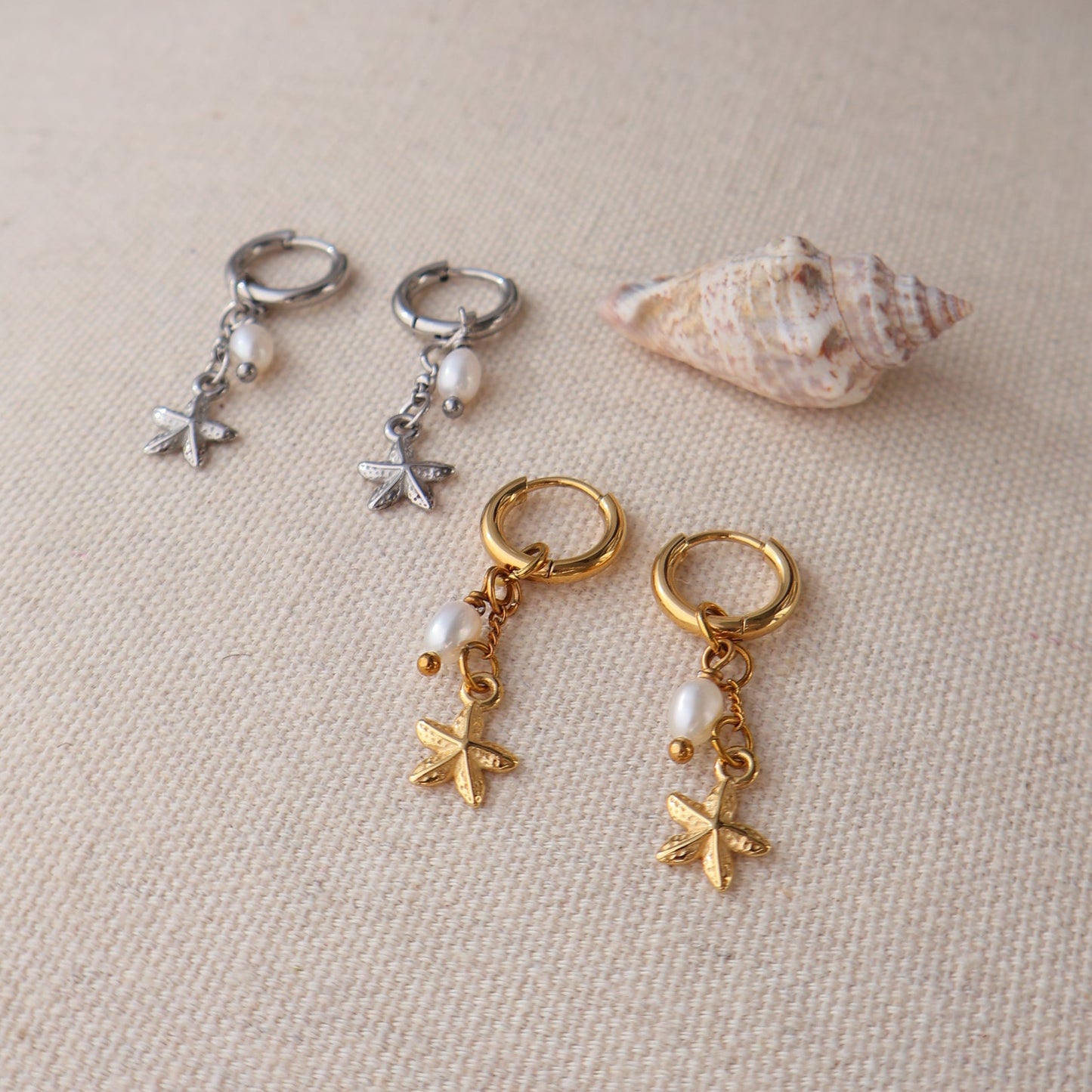 Gold and silver starfish earrings