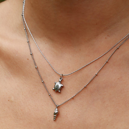 silver worm shell necklace