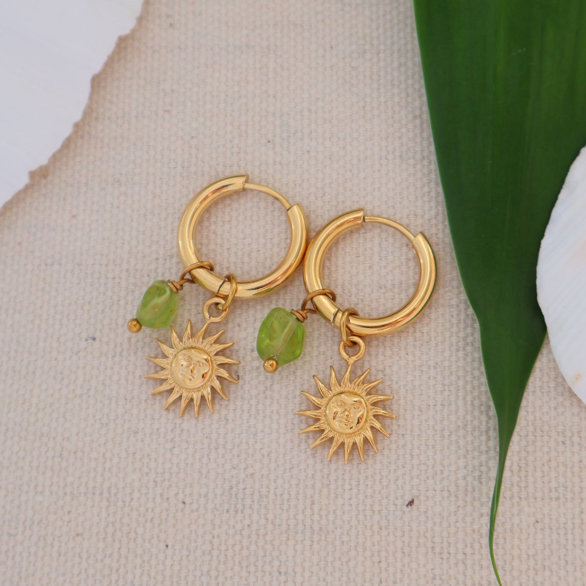 Peridot sun earrings