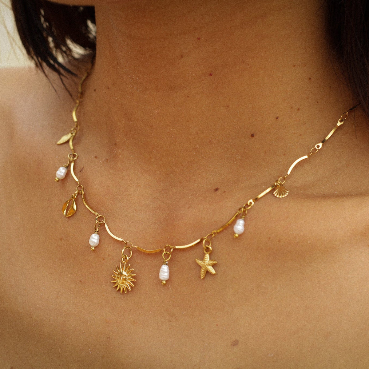 marea pearl multicharm necklace